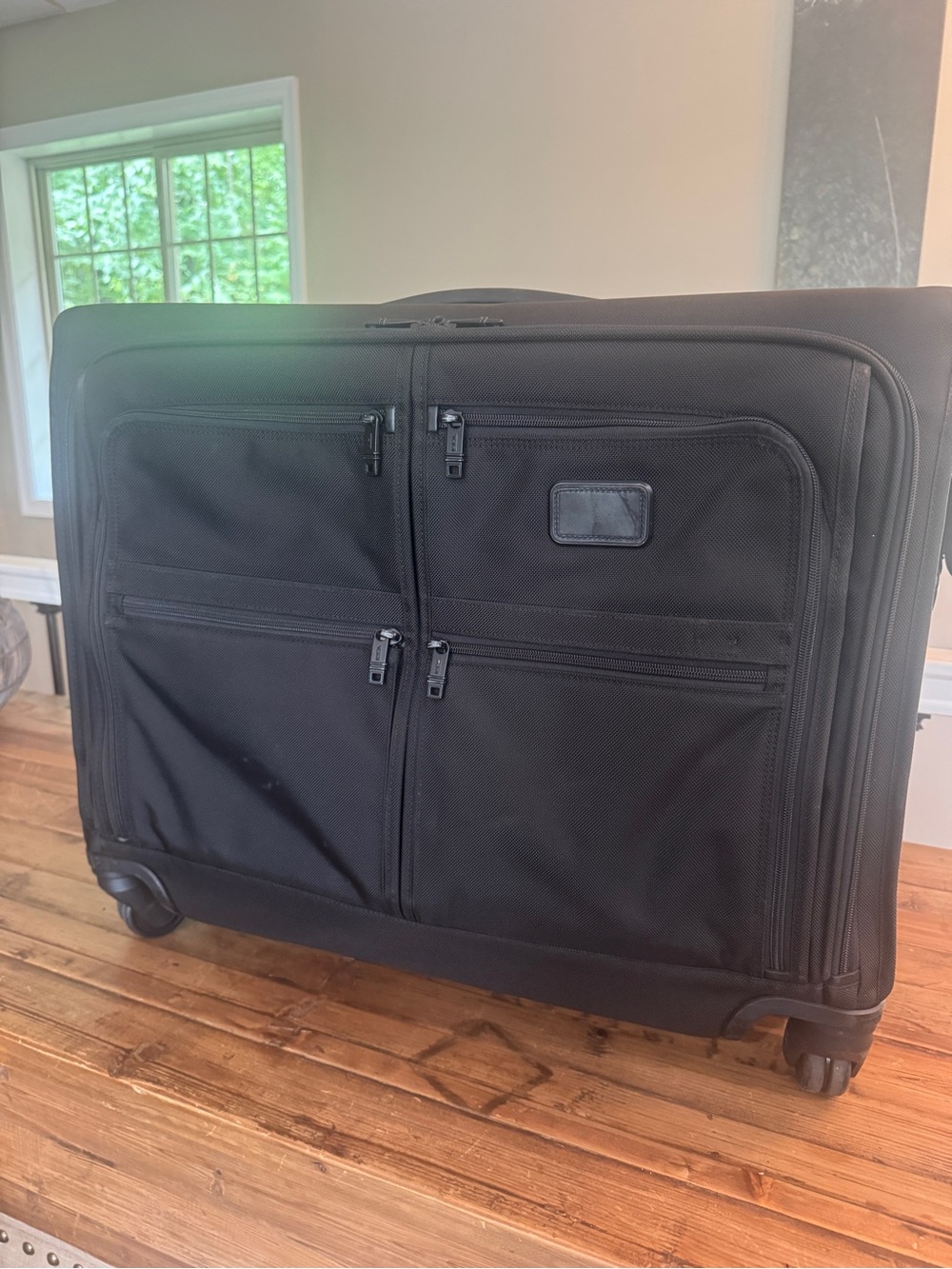 Tumi Alpha 2 medium trip rolling garmet suitcase
